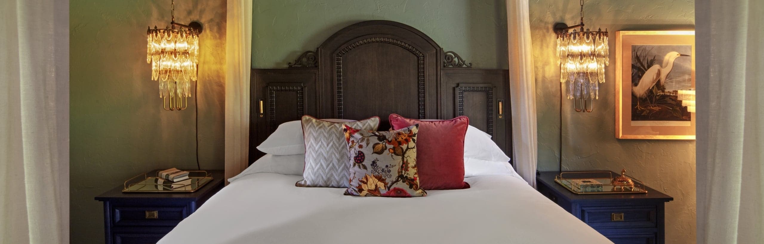 Image of queen bed in Island Escape Suite