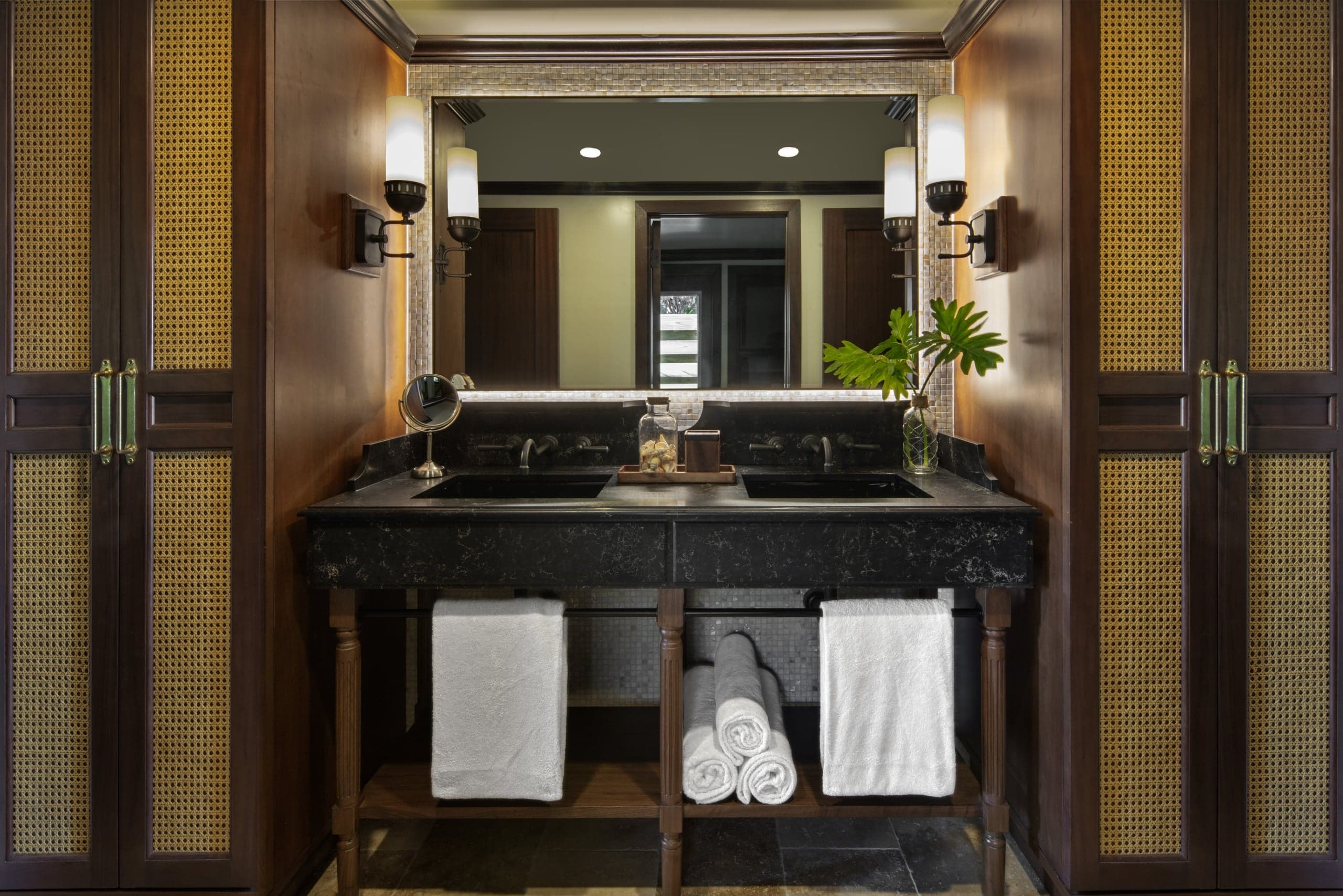 Double sink vanity in a room at Little Palm Island