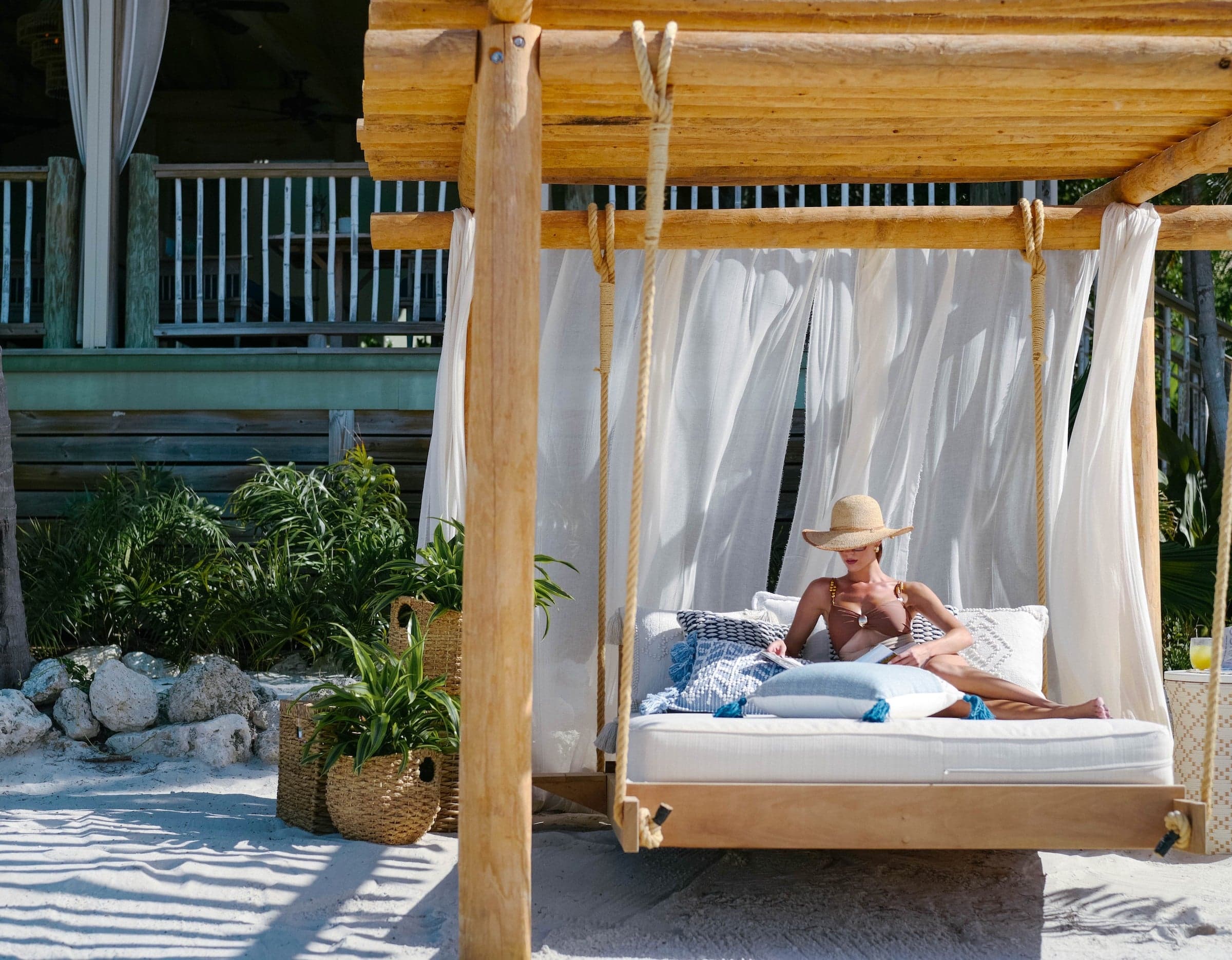 A woman enjoying a signature amenity at Little Palm Island Resort