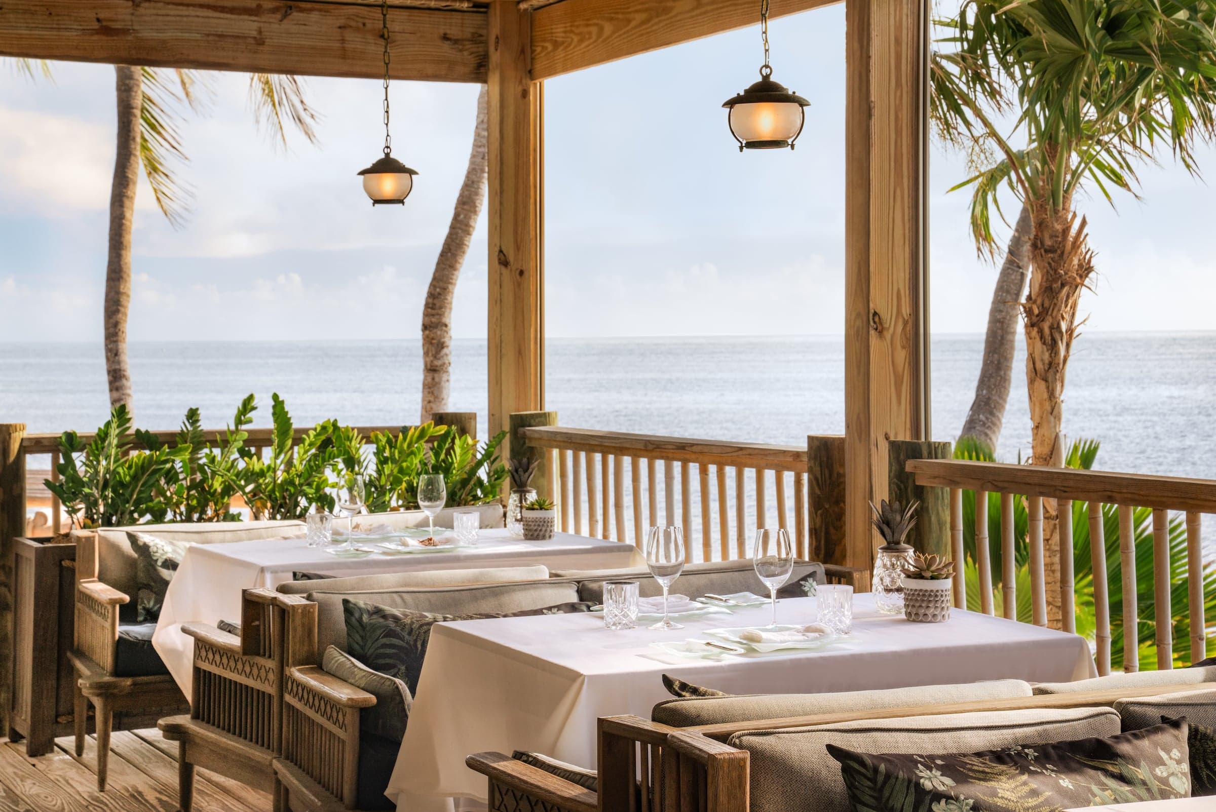 White table cloths set up for dinner at Little Palm Island Resort