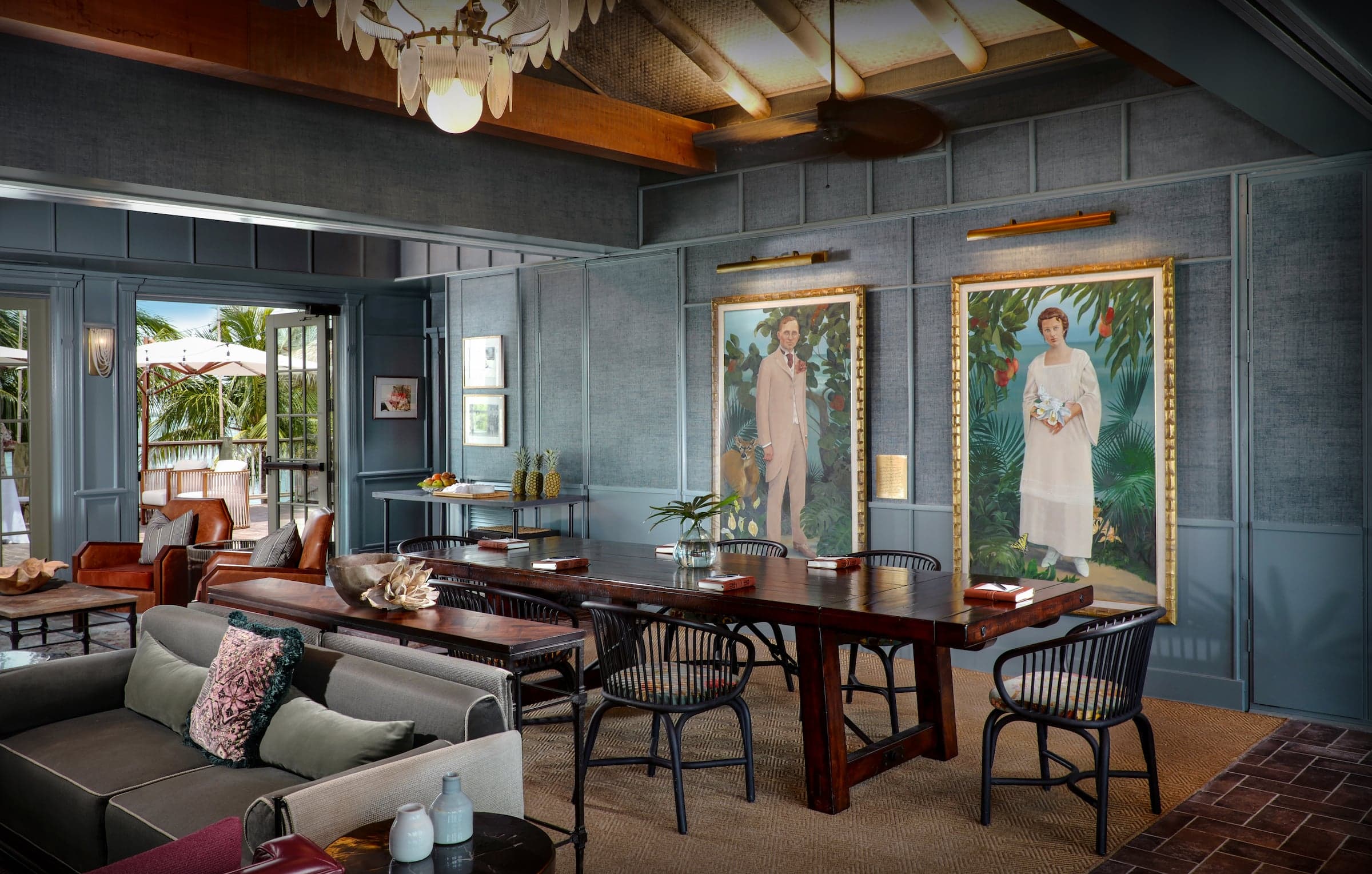 Paintings hung up inside the Great Room at Little Palm Island Resort