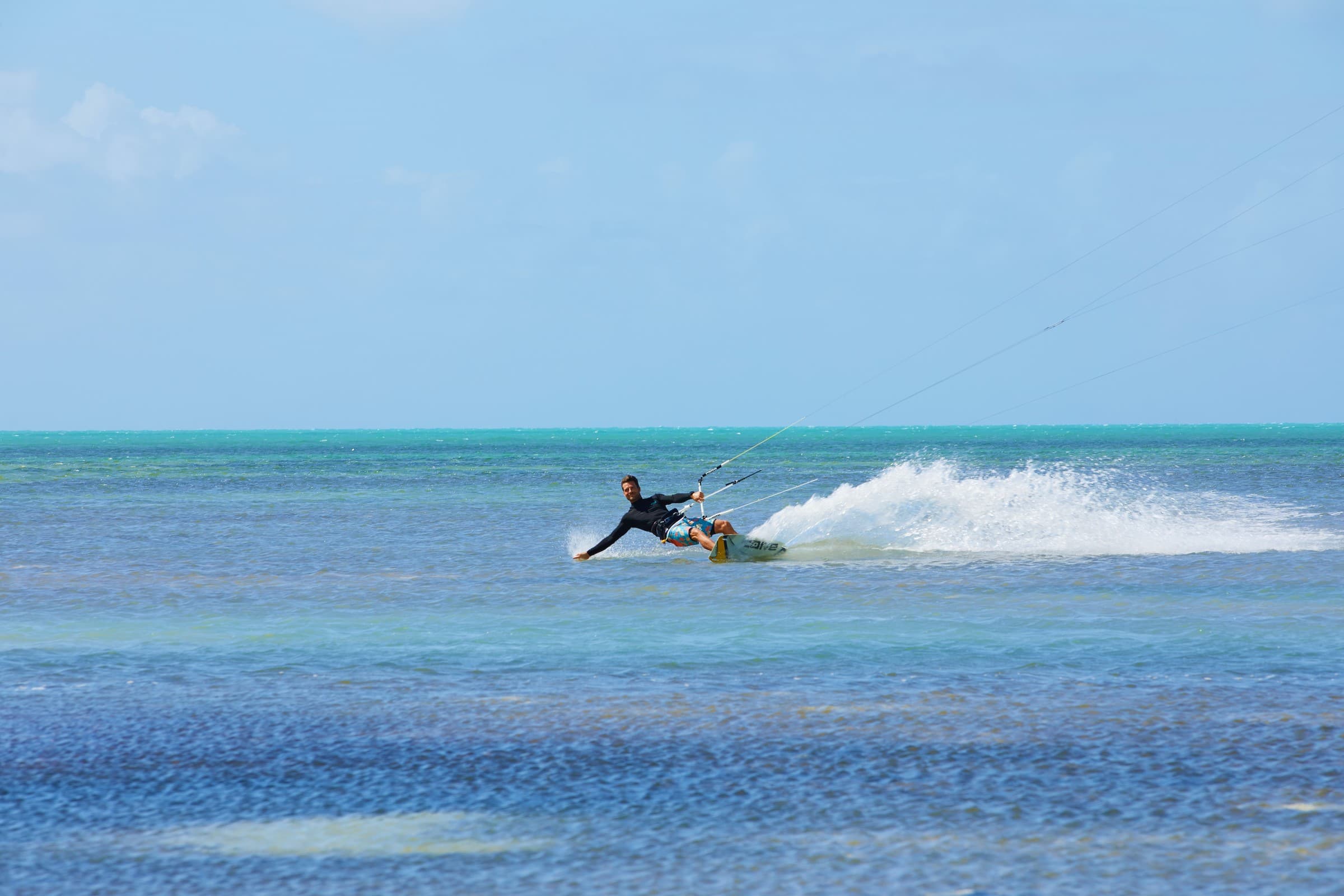 A person wakeboarding at Little Palm Island Resort