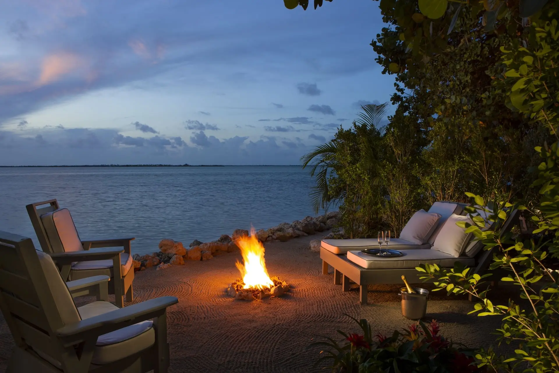 A beachside fire pit at Little Palm Island