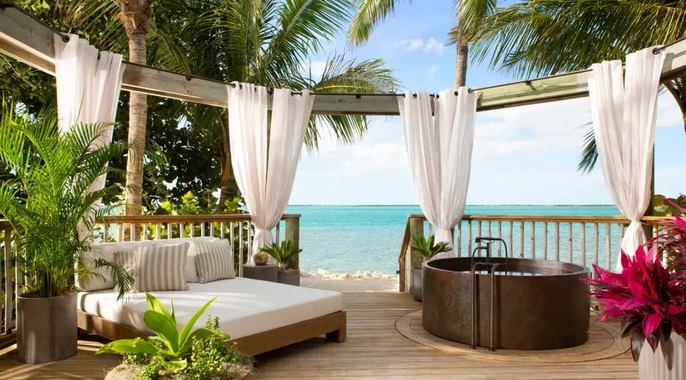 The Island Romantic Suite private patio with day bed and jacuzzi