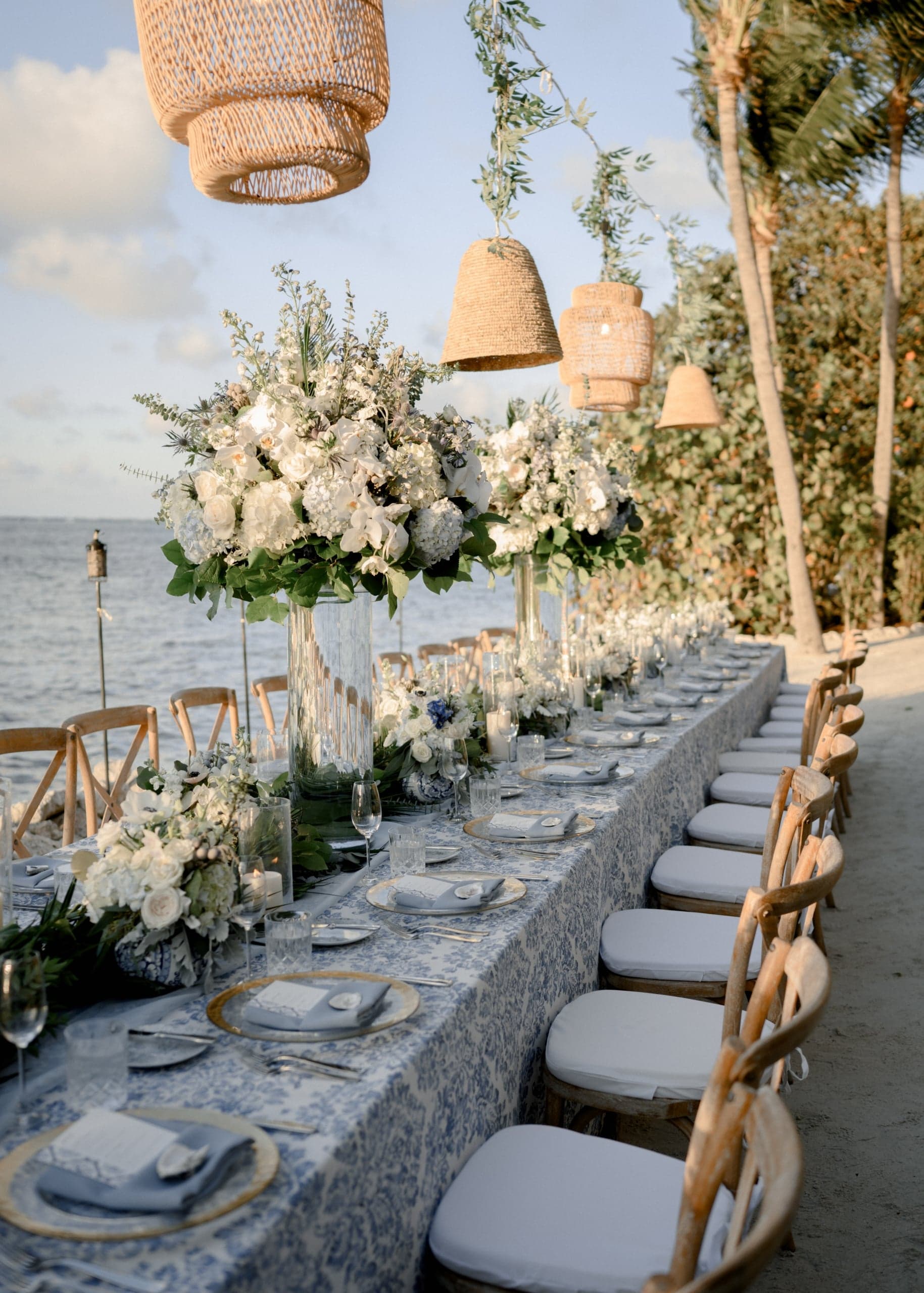 A dining table set up at the harbor's edge on Little Palm Island.