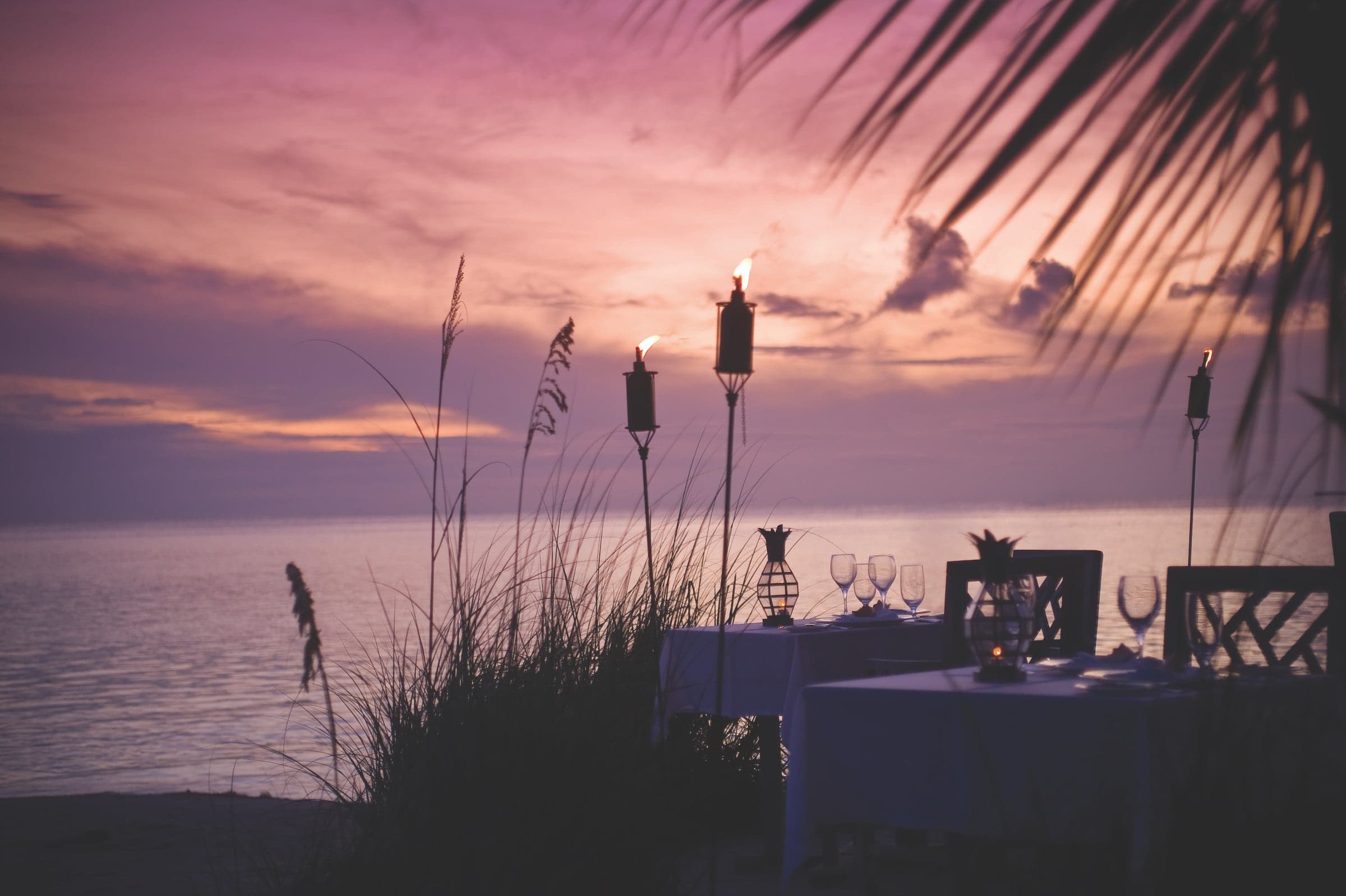A beachside table set up on Little Palm Island Resort